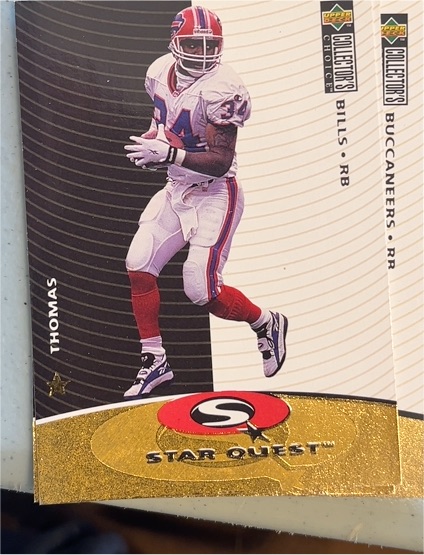 1997 Upper Deck Collector's Choice StarQuest #SQ4 Thurman Thomas — front