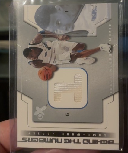 2003-04 Fleer E-X Behind the Numbers Game-Used #21 Kwame Brown Jersey — front