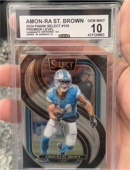 2024 Panini Select Premier Level #105 Amon-Ra St. Brown — front