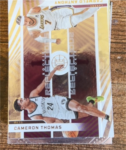 2021-22 Panini Illusions #20 Cameron Thomas / Carmelo Anthony Rookie Reflections — front