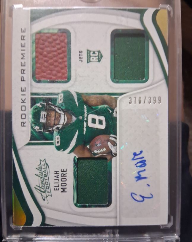 2021 Panini Absolute Rookie Premiere Materials Autos #214 Elijah Moore — front