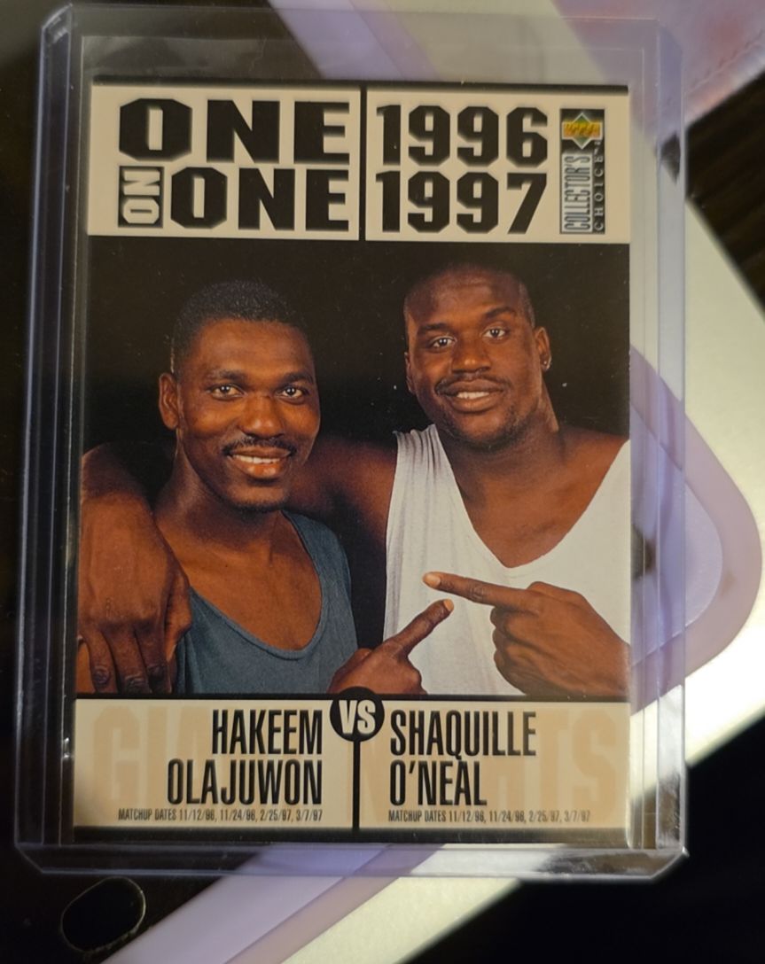 1996-97 Upper Deck Collector's Choice #357 Hakeem Olajuwon vs Shaquille O'Neal — front