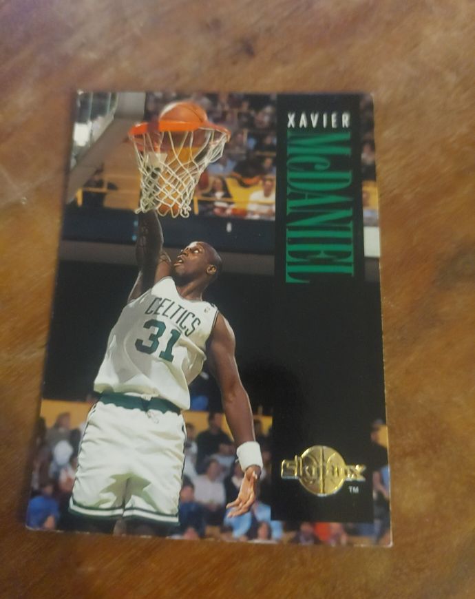 1994-95 SkyBox Premium #12 Xavier McDaniel — front