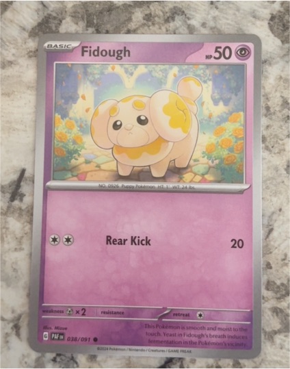 2024 Pokémon Scarlet & Violet Paldean Fates #038 Fidough — front