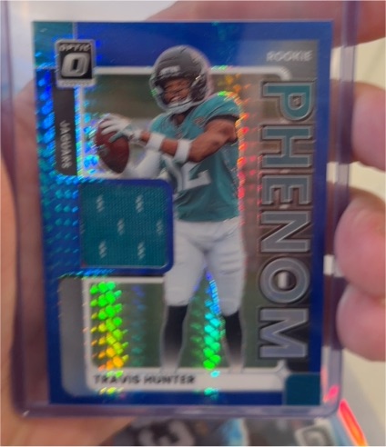 2025 Panini Donruss Optic #RPBH-THR Travis Hunter Rookie Phenom Blue Hyper Patch — front