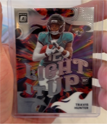 2025 Panini Donruss Optic #4 Travis Hunter Light It Up — front