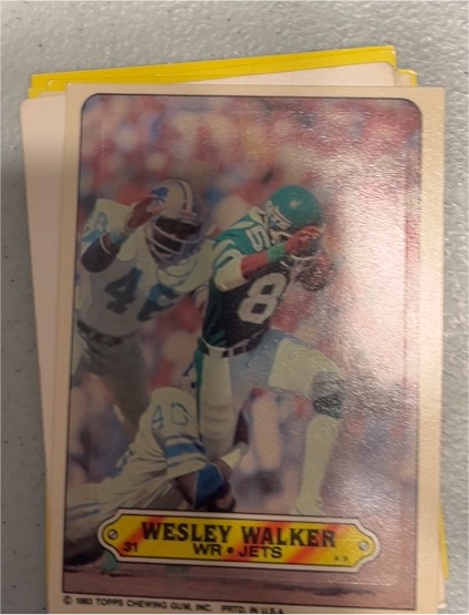 1983 Topps Football Sticker #31 Wesley Walker — front