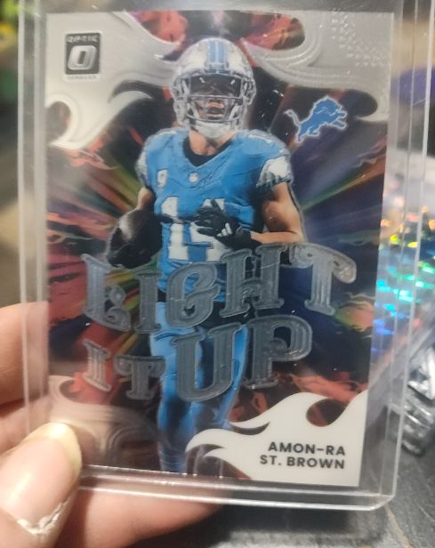 2025 Panini Donruss Optic #15 Amon-Ra St. Brown Light It Up — front