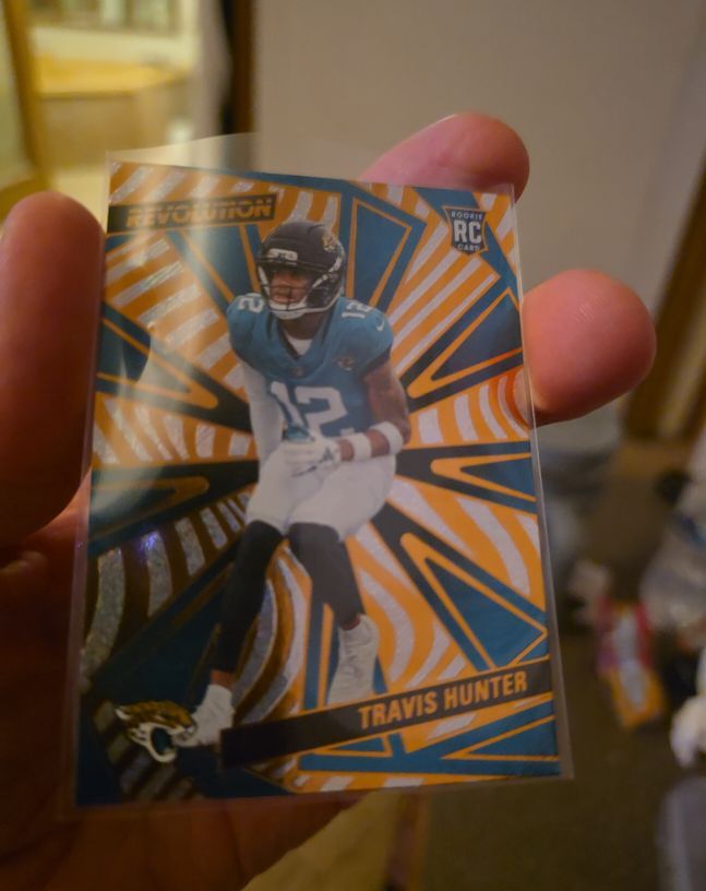 2025 Panini Revolution #242 Travis Hunter — front