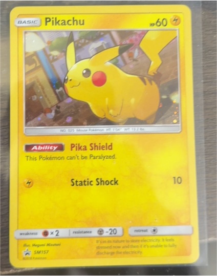 2017 Pokemon Sun & Moon #SM157 Pikachu Black Star Promo — front