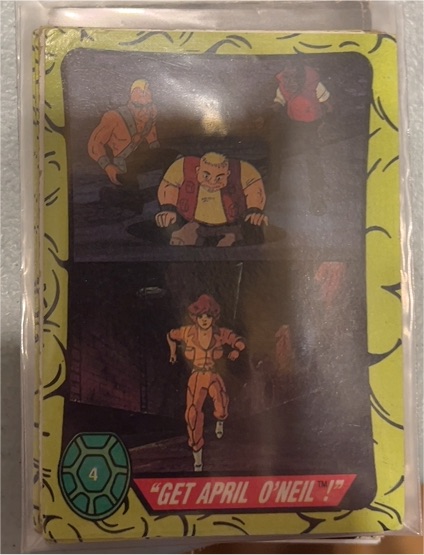 1989 Topps Teenage Mutant Ninja Turtles #4 Get April O'Neil — front