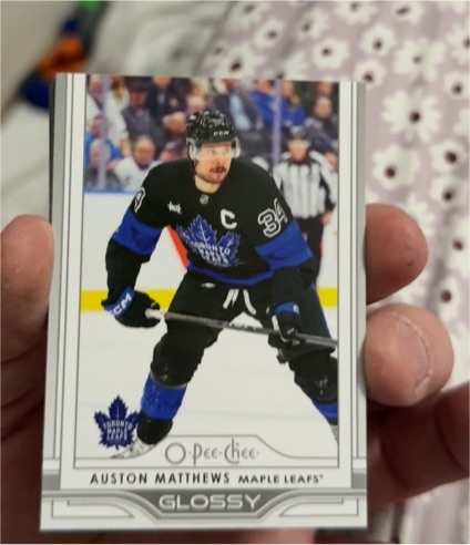 2025-26 Upper Deck Series 1 O-Pee-Chee Glossy #OG-25 Auston Matthews — front