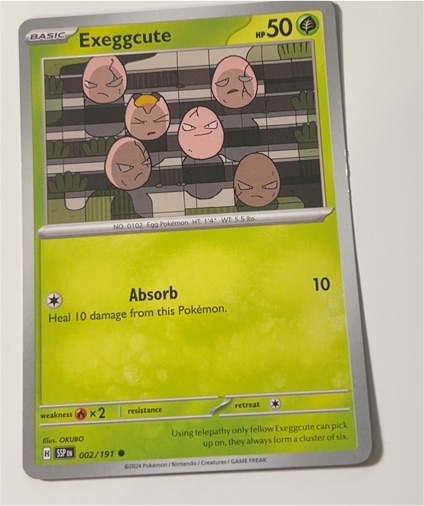2024 Pokémon TCG SV08 Surging Sparks #002 Exeggcute — front