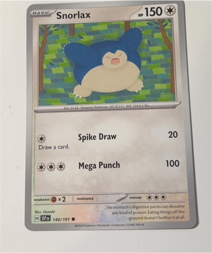 2024 Pokémon SV08: Surging Sparks #144 Snorlax — front