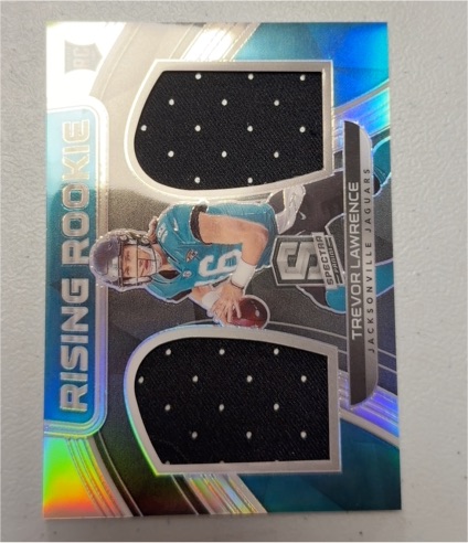 2021 Panini Spectra Rising Rookie #RRM-TL Trevor Lawrence — front