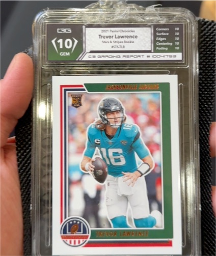 2021 Panini Chronicles Stars & Stripes #STS-TLR Trevor Lawrence — front