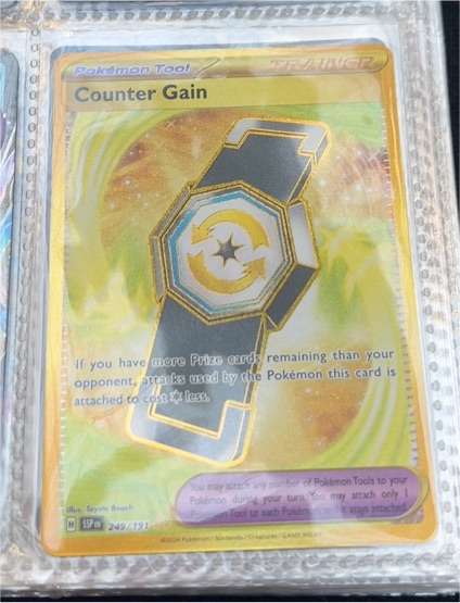 2024 Pokémon SV08: Surging Sparks #249/191 Counter Gain — front
