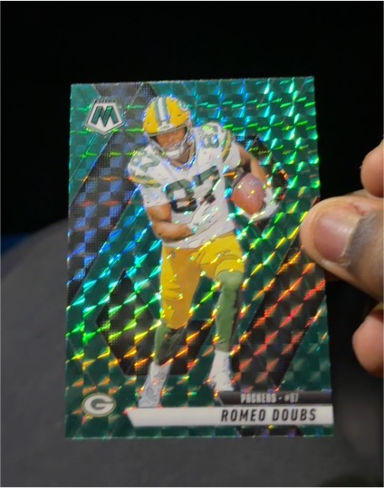 2025 Panini Mosaic #130 Romeo Doubs Mosaic Reactive Yellow — front