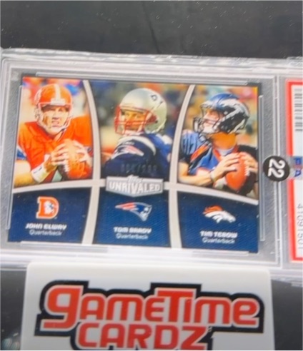 2010 Panini Unrivaled #22 John Elway / Tom Brady / Tim Tebow — front