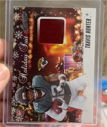 2025 Panini Absolute Holiday Suit #HS-THU Travis Hunter — front
