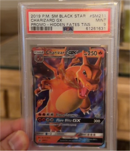 2019 Pokemon SM Black Star Promo #SM211 Charizard GX — front