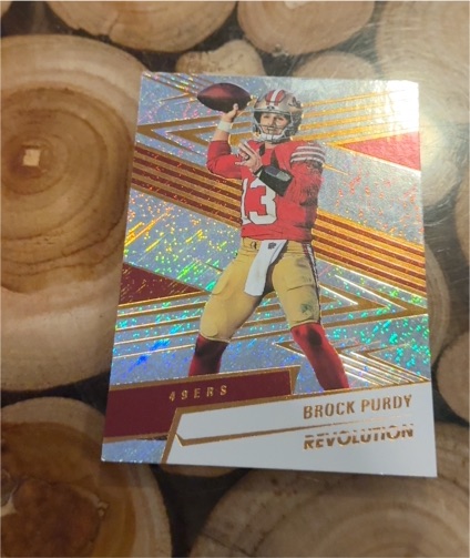 2025 Panini Revolution #150 Brock Purdy — front