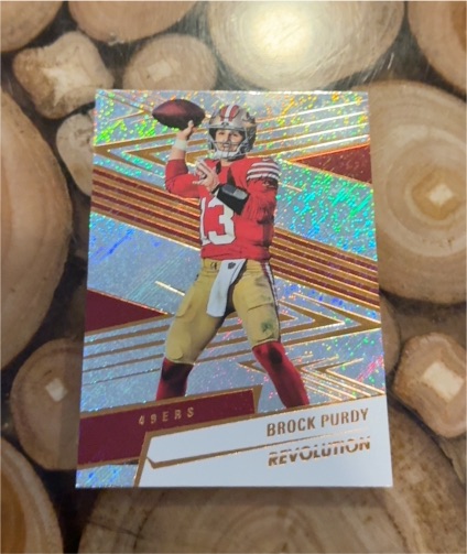 2025 Panini Revolution #150 Brock Purdy — front