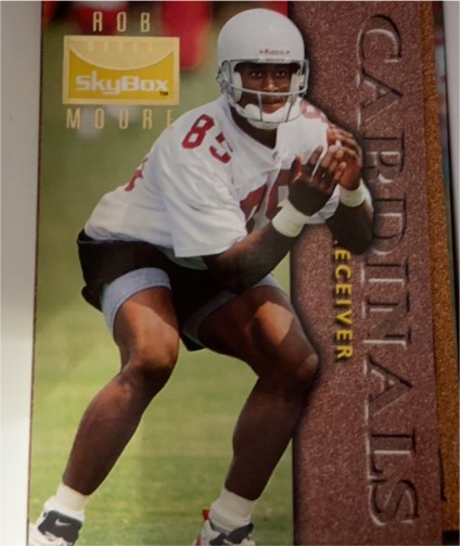1995 SkyBox Premium #3 Rob Moore — front