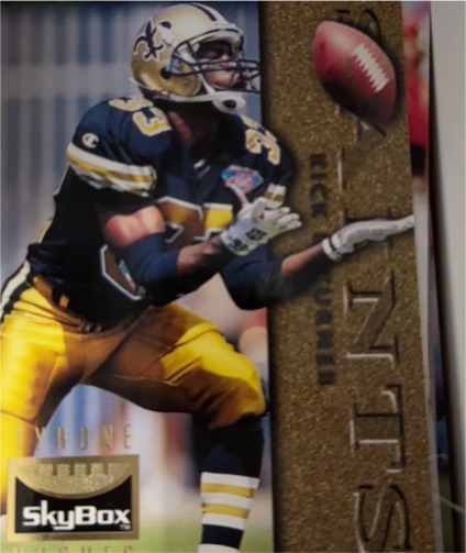 1995 SkyBox Premium #87 Tyrone Hughes — front