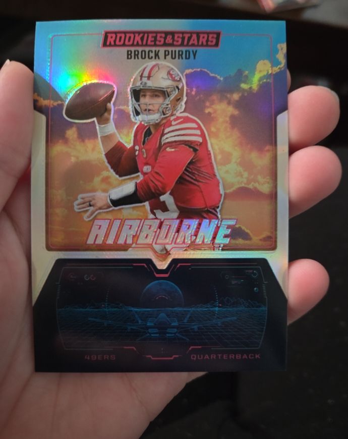 2025 Panini Rookies & Stars #21 Brock Purdy Airborne Silver — front