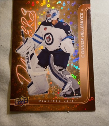 2024-25 Upper Deck Series 1 Dazzlers #DZ-48 Connor Hellebuyck — front