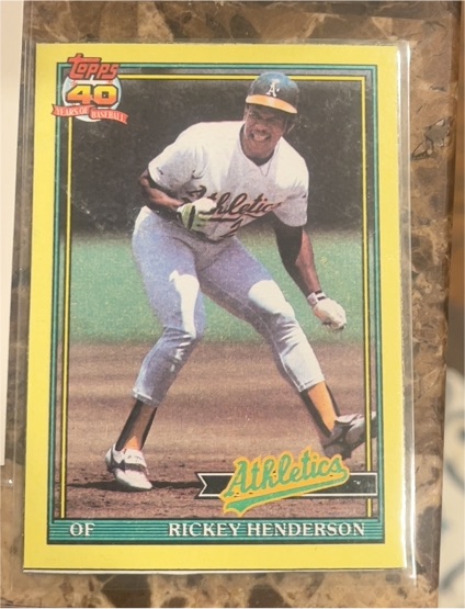 1991 Topps #H Rickey Henderson — front