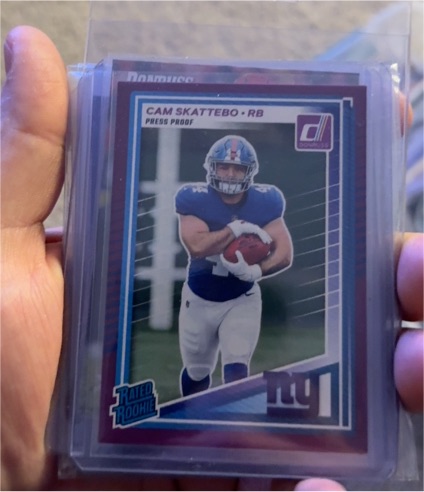 2025 Panini Donruss #302 Cam Skattebo Rated Rookie Press Proof Green — front