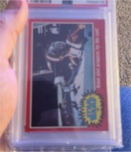1977 Topps Star Wars #84 Rebel Pilot Prepares For The Raid! — front