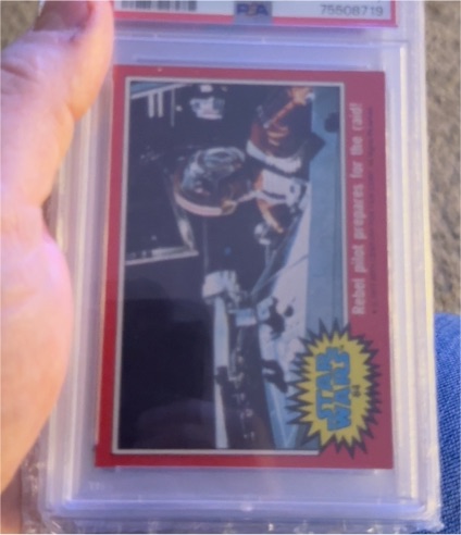 1977 Topps Star Wars #84 Rebel Pilot Prepares For The Raid — front