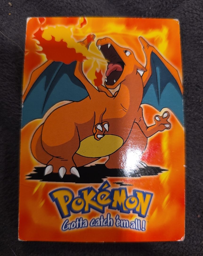 1999 Topps Pokémon The First Movie #E6 Charizard — front