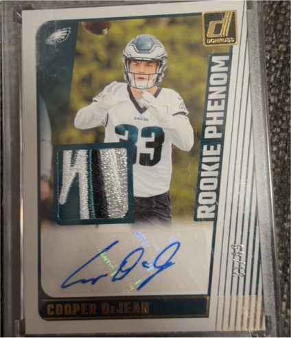 2024 Donruss #RJA-CDE Cooper DeJean Rookie Phenom Jersey Autographs — front