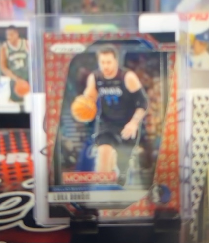 2024-25 Panini Prizm Monopoly #24 Luka Doncic — front