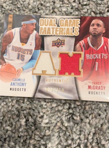 2009-10 Upper Deck Dual Game Materials #DG-AT Carmelo Anthony & Tracy McGrady — front