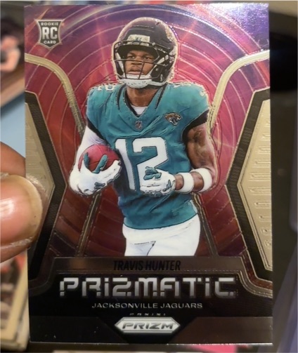 2025 Panini Prizm #12 Travis Hunter Prizmatic — front