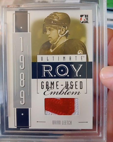 2005-06 ITG Ultimate R.O.Y. Game-Used Emblem Brian Leetch — front