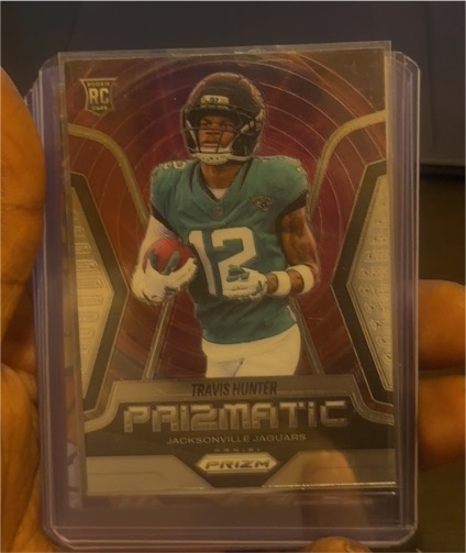 2025 Panini Prizm #12 Travis Hunter — front