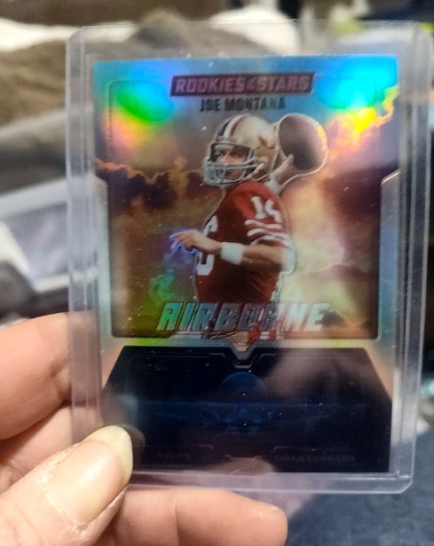 2025 Panini Rookies & Stars #12 Joe Montana Airborne Silver Prizm — front