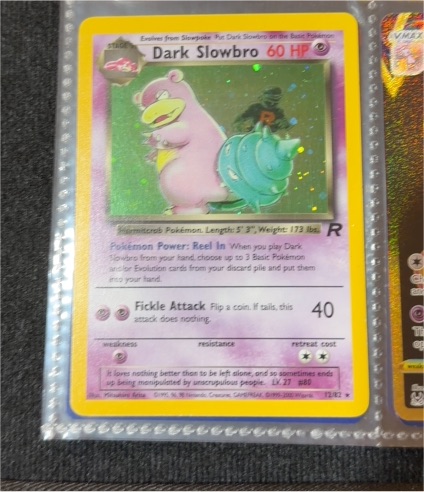 1999 Pokémon Team Rocket #12 Dark Slowbro — front
