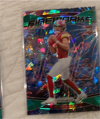 2024 Panini Prizm Fireworks #24 Jayden Daniels Green Ice Prizm Rookie — front