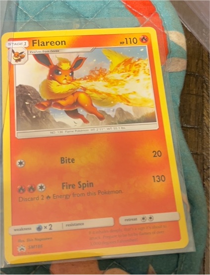 Flareon SM186 Sun & Moon Black Star Promo — front