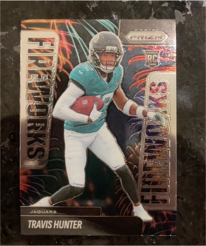 2025 Panini Prizm #13 Travis Hunter Fireworks Rookie — front