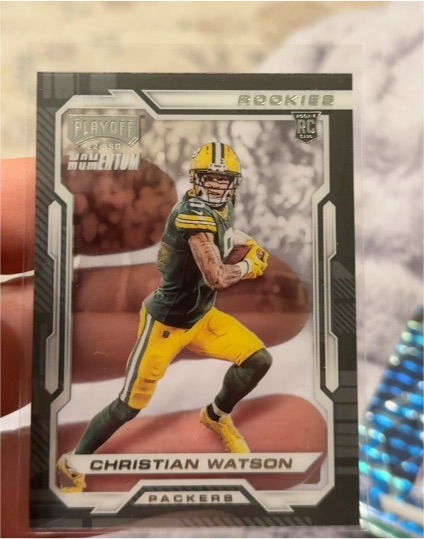 2022 Panini Chronicles Playoff Momentum #PMR-17 Christian Watson — front