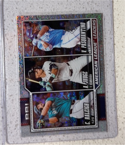 2026 Topps Series 1 #211 AL RBI Leaders Aaron Judge Cal Raleigh Vinnie Pasquantino — front