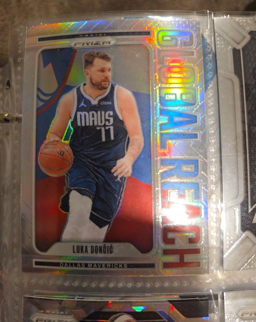 2024-25 Panini Prizm #8 Luka Dončić Global Reach Silver — front